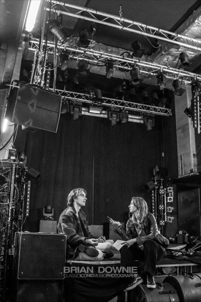 Caroline Landré interviewing Stavros Dzodzos of Dirty Sound Magnet. Photo by Brian Downie